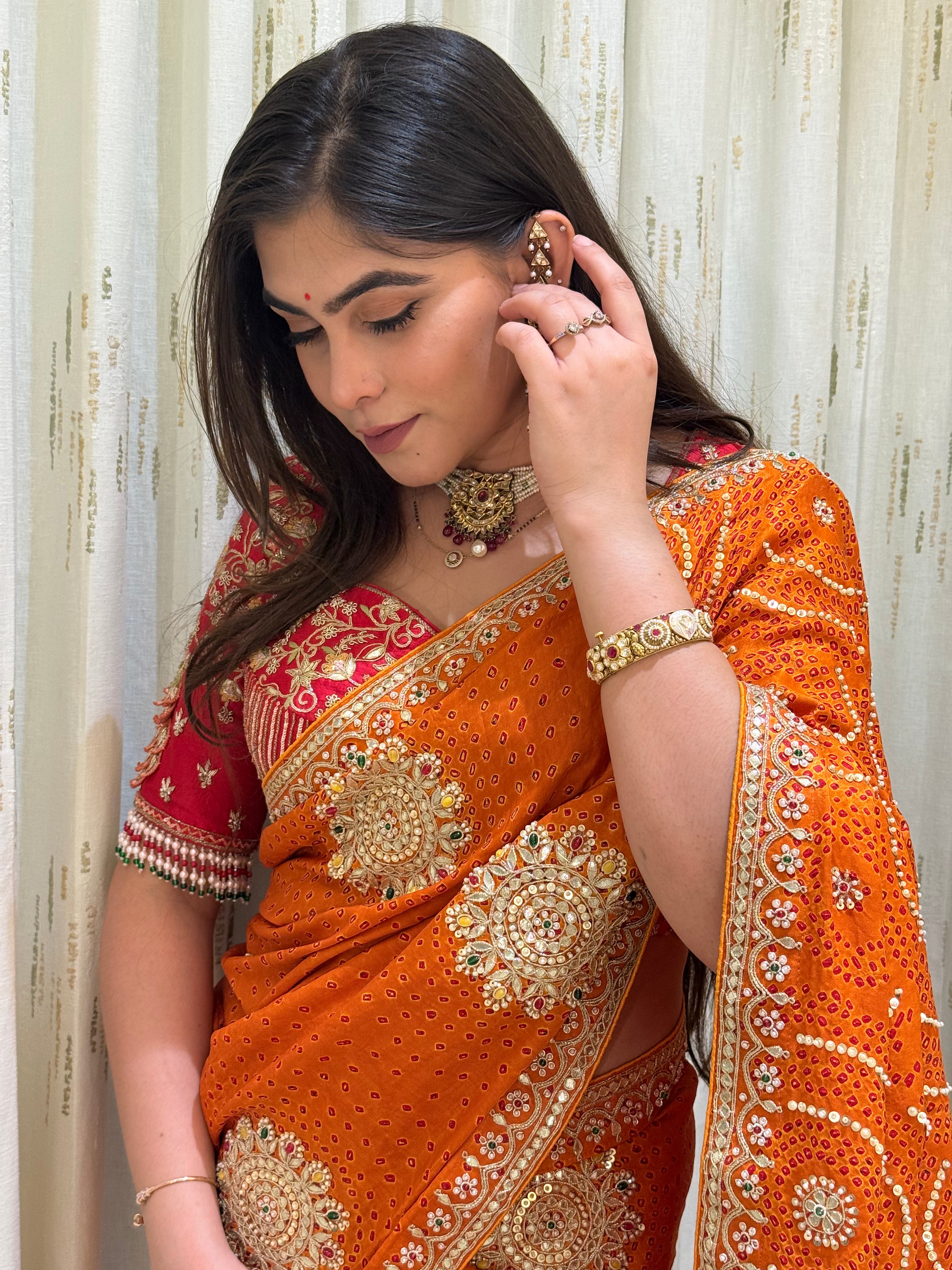 Amisha Haldi Orange Bandhani Saree