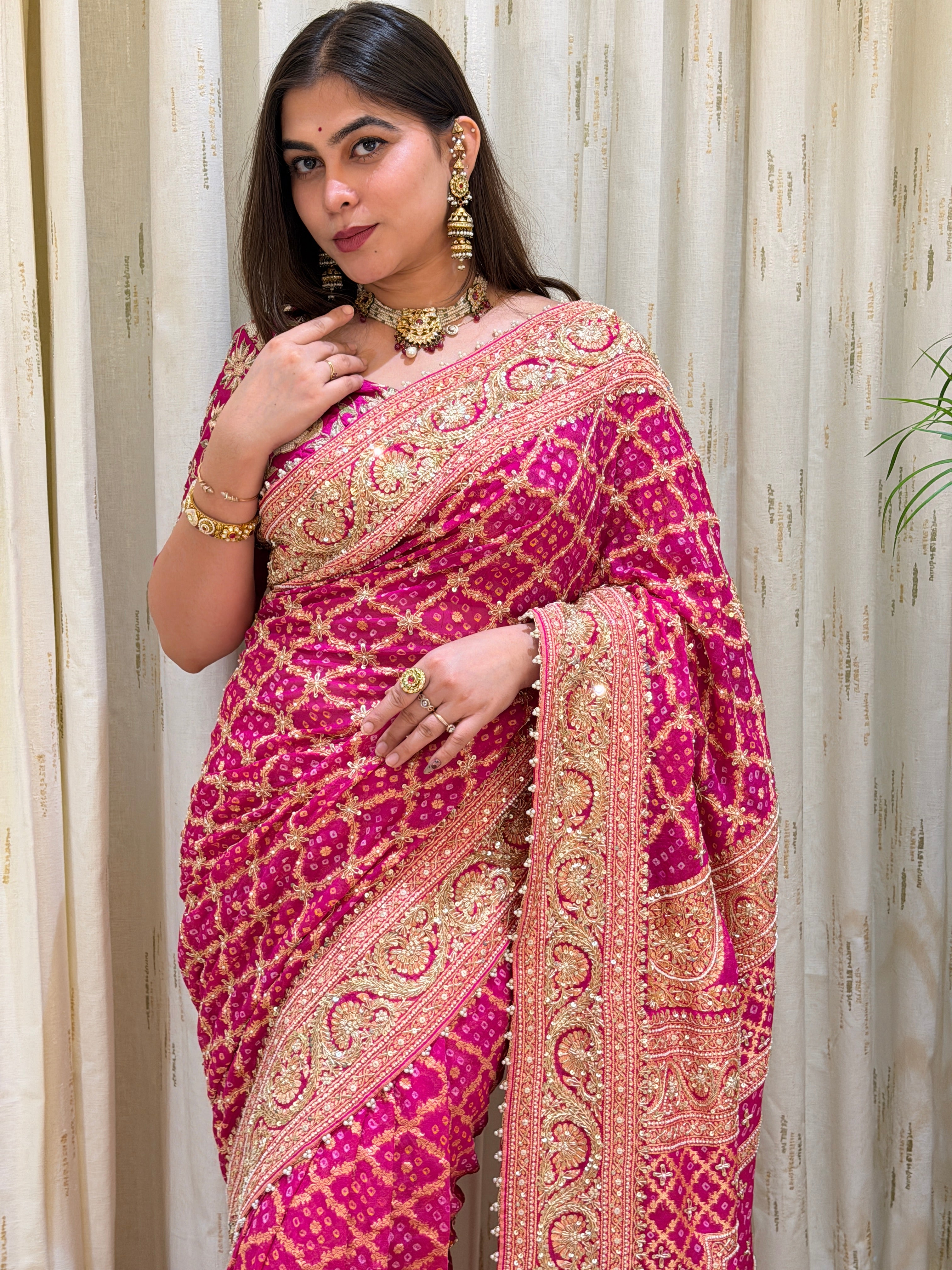 Deveshi Pink Khadi Georgette Bandhani Saree
