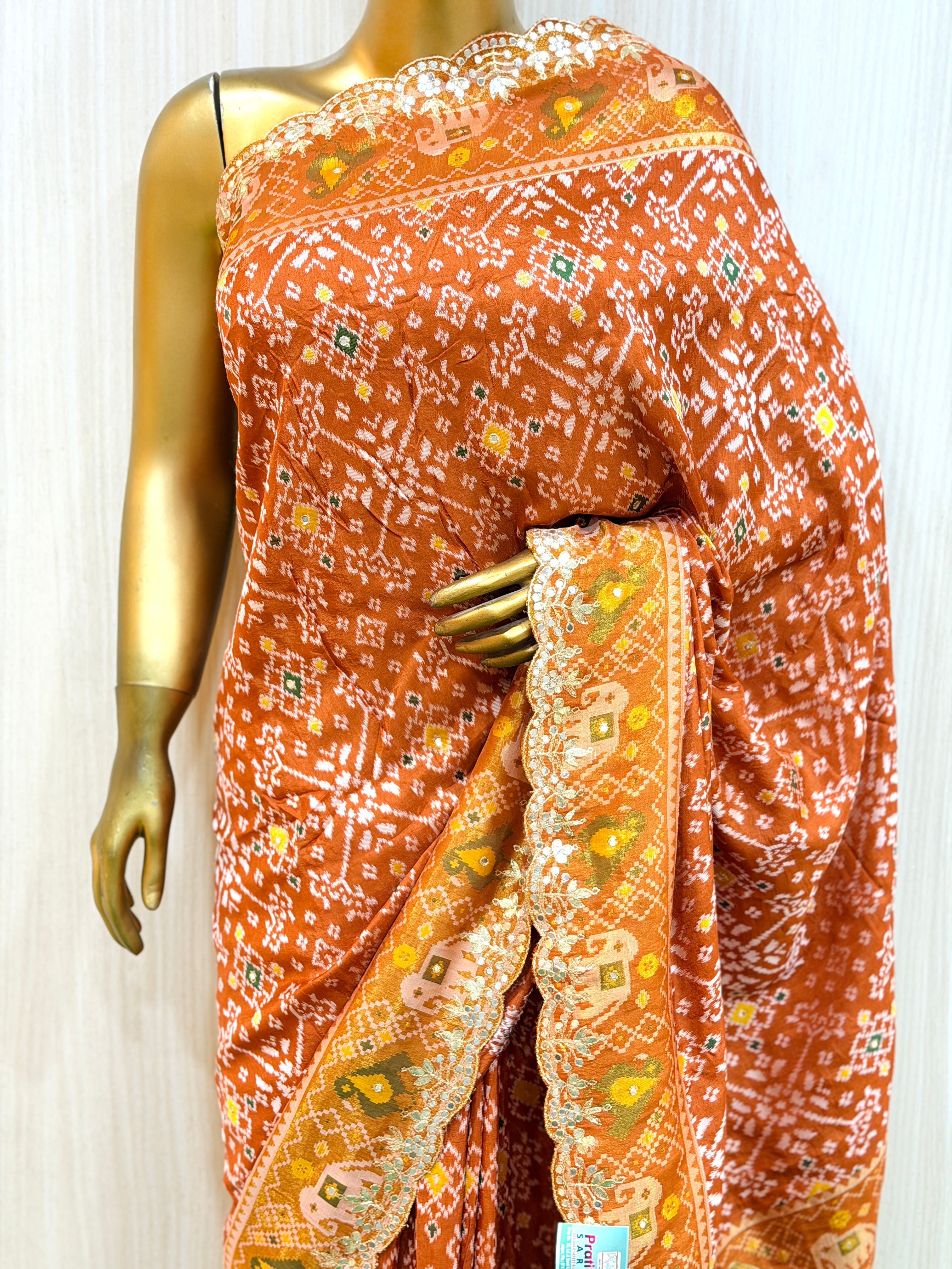 Aarohi Rust Orange Traditional Patola Silk Saree