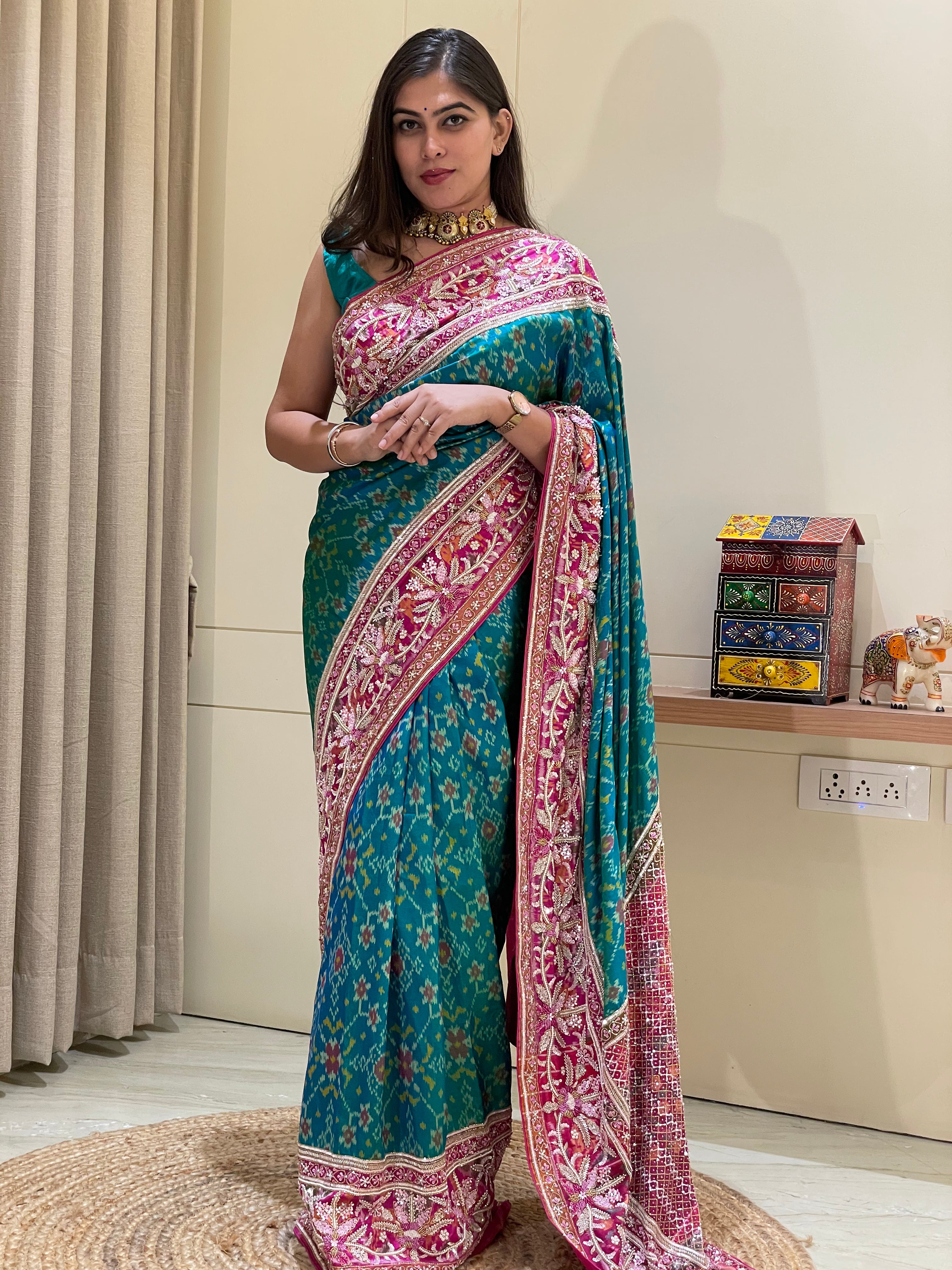 Nikita Pure Blue And Green Pratola Silk Saree