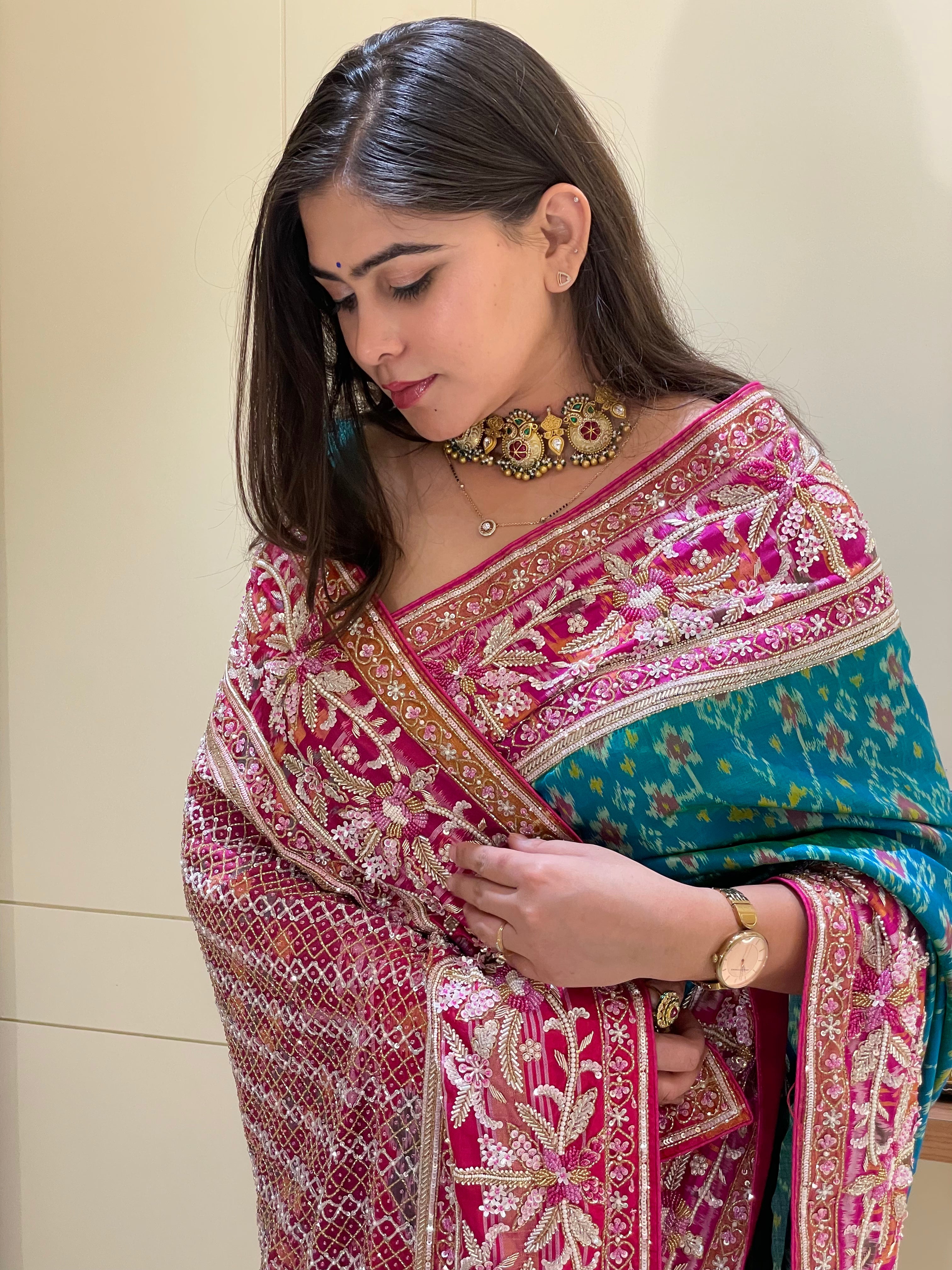 Nikita Pure Blue And Green Pratola Silk Saree