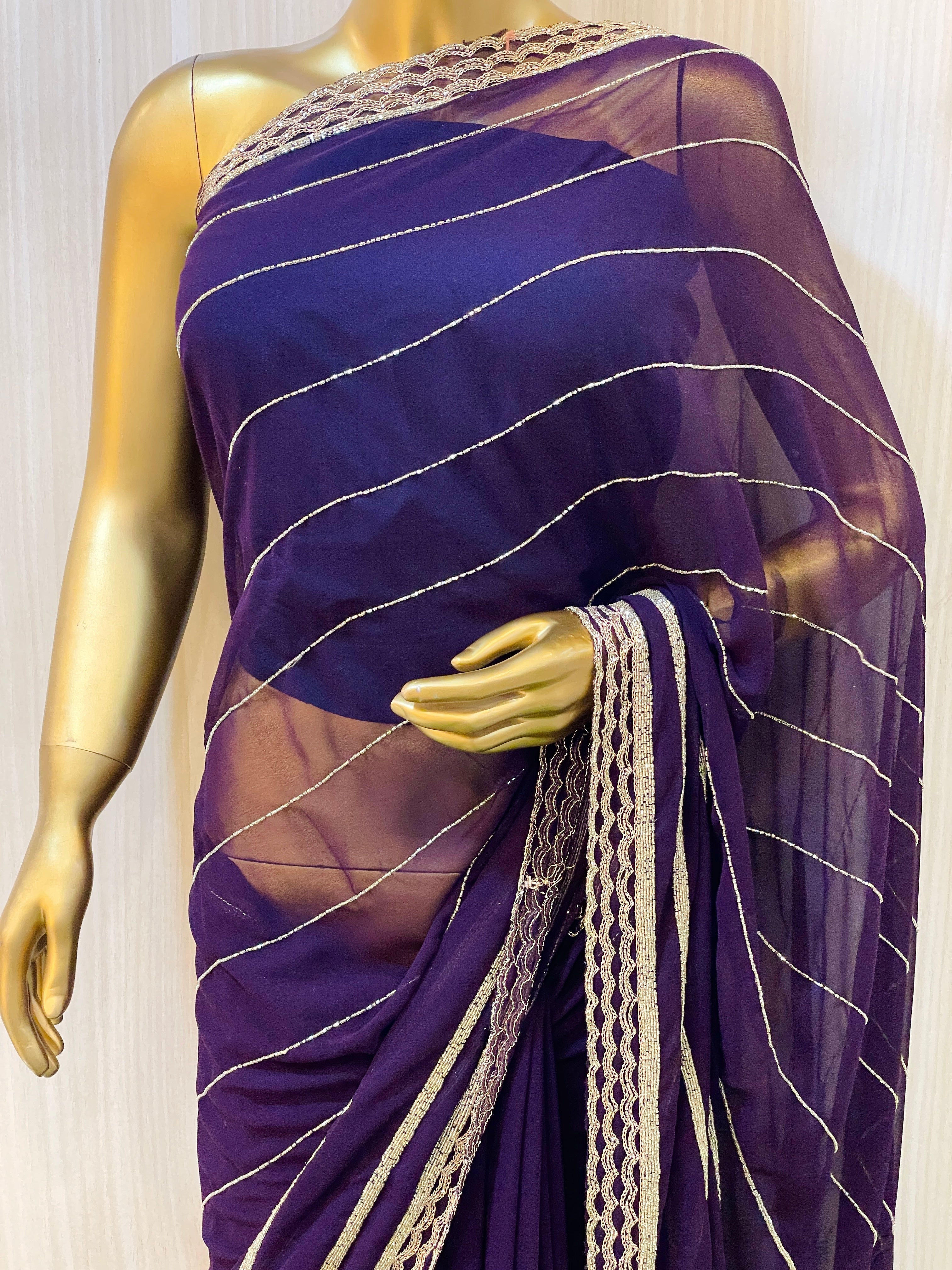 Vinisha Purple Georgette Saree