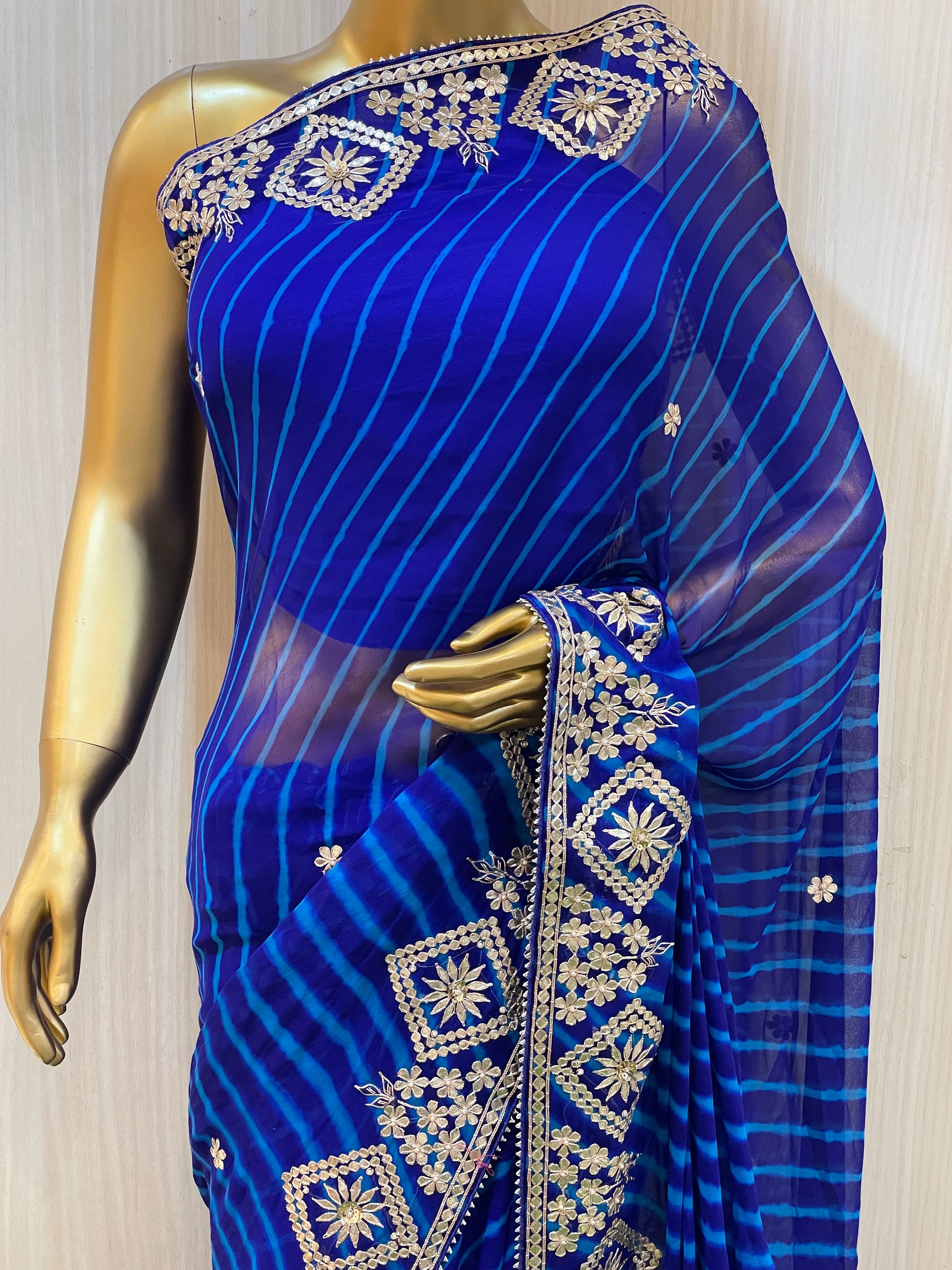 Radhika Blue Leheriya Saree