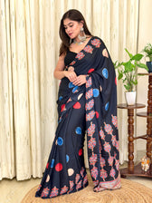 Side profile view of the elegant black printed crepe saree, highlighting the fluid drape and modern ethnic aesthetic perfect for festive wear.