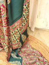 Detailed view of ivory Ajrakh pallu with fern leaf band and circular medallions