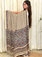 Ivory Ajrakh saree pallu held open showing scroll and diamond medallion pattern