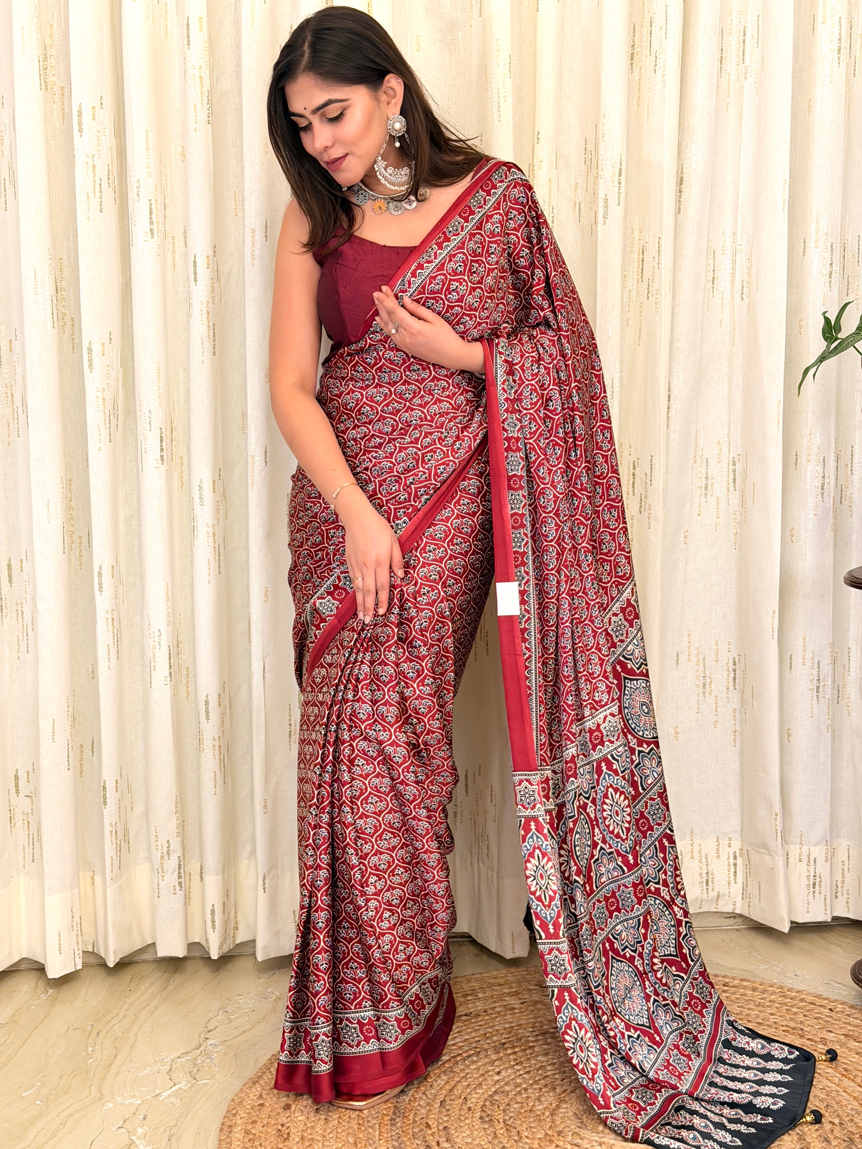 Maroon Ajrakh leaf print modal silk saree draped on model - full front view