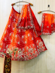 Munazir Orange Bandhani Lehenga