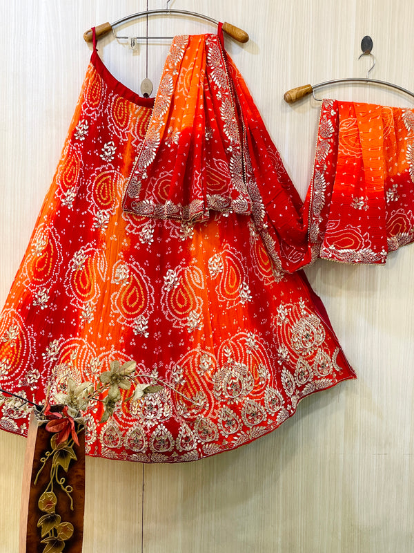 Munazir Orange Bandhani Lehenga
