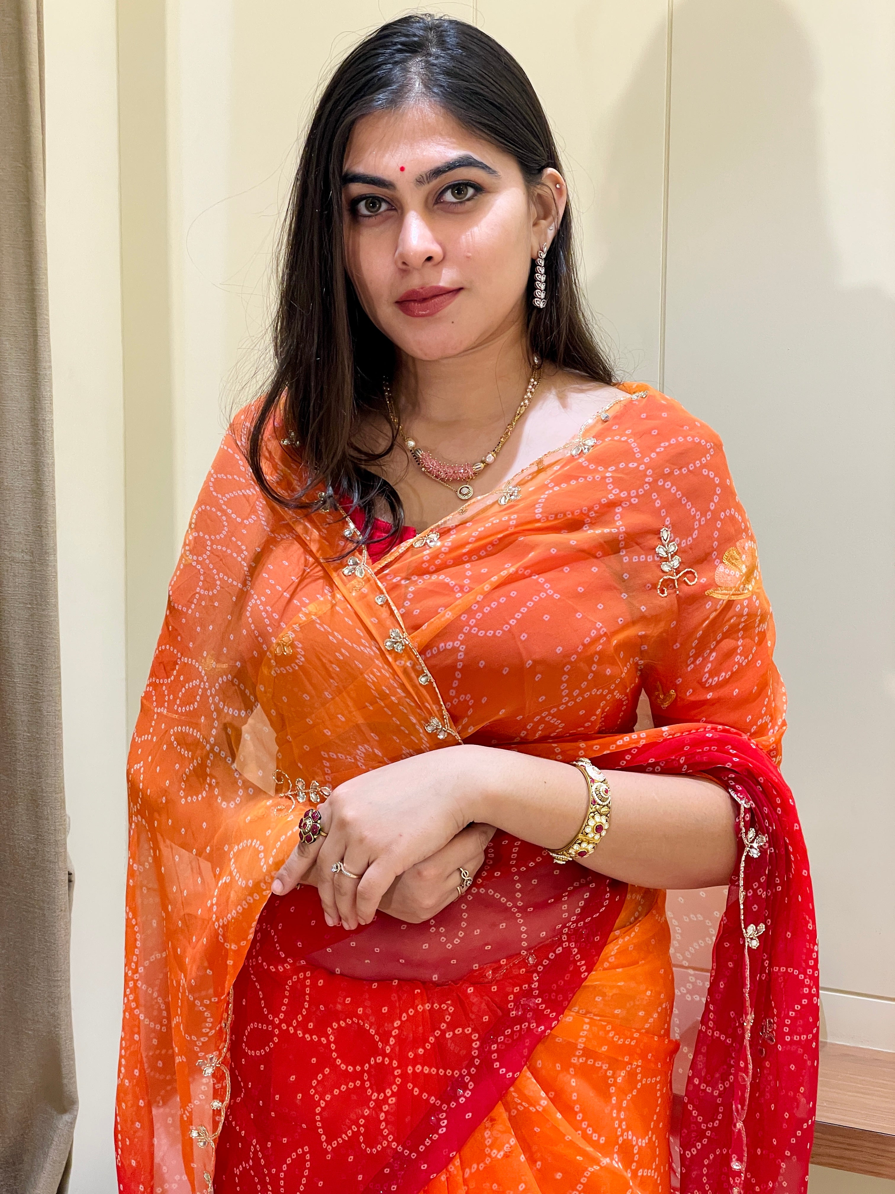 Trisha Red & Orange Georgette Saree