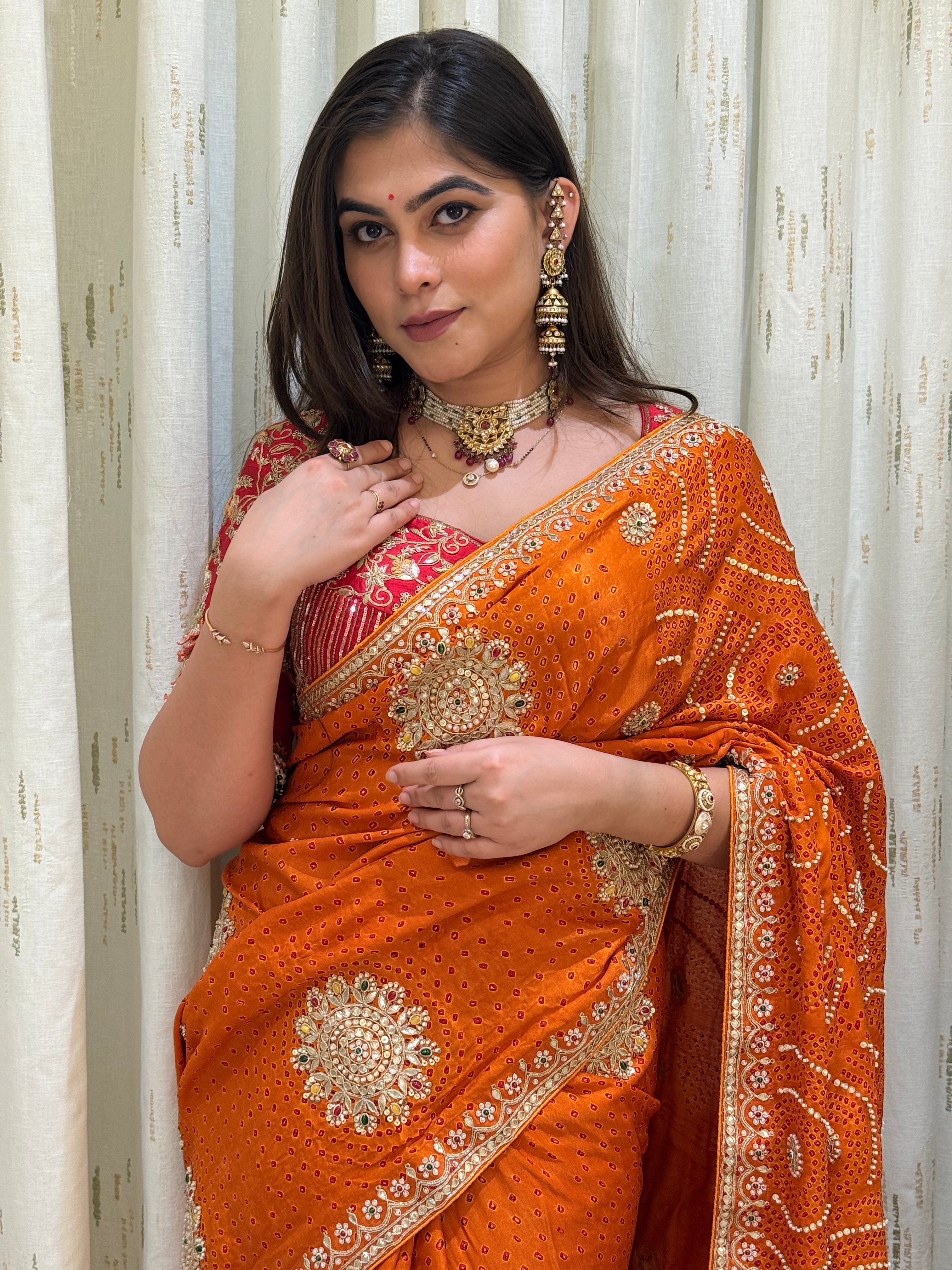 Amisha Haldi Orange Bandhani Saree