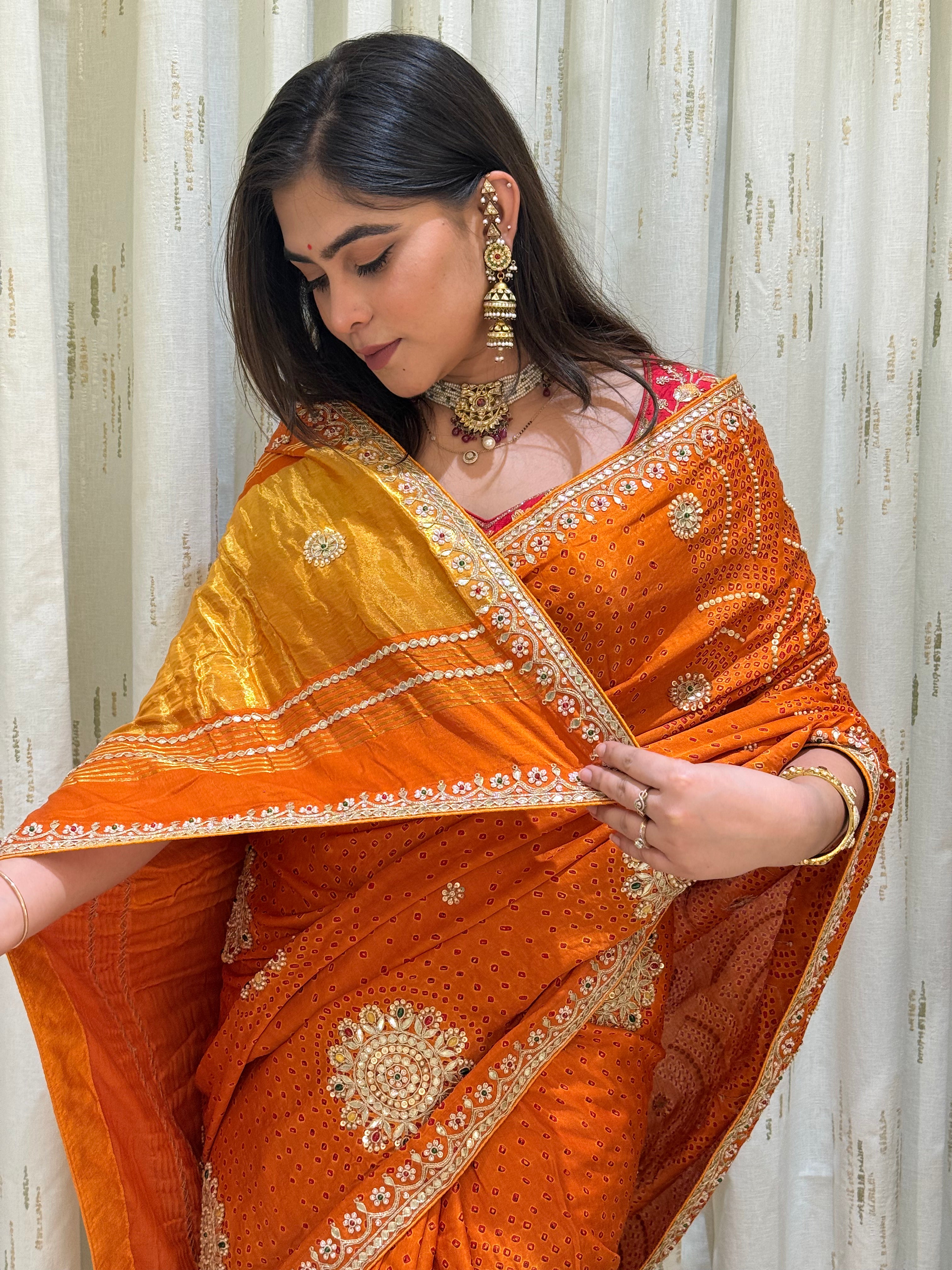 Amisha Haldi Orange Bandhani Saree