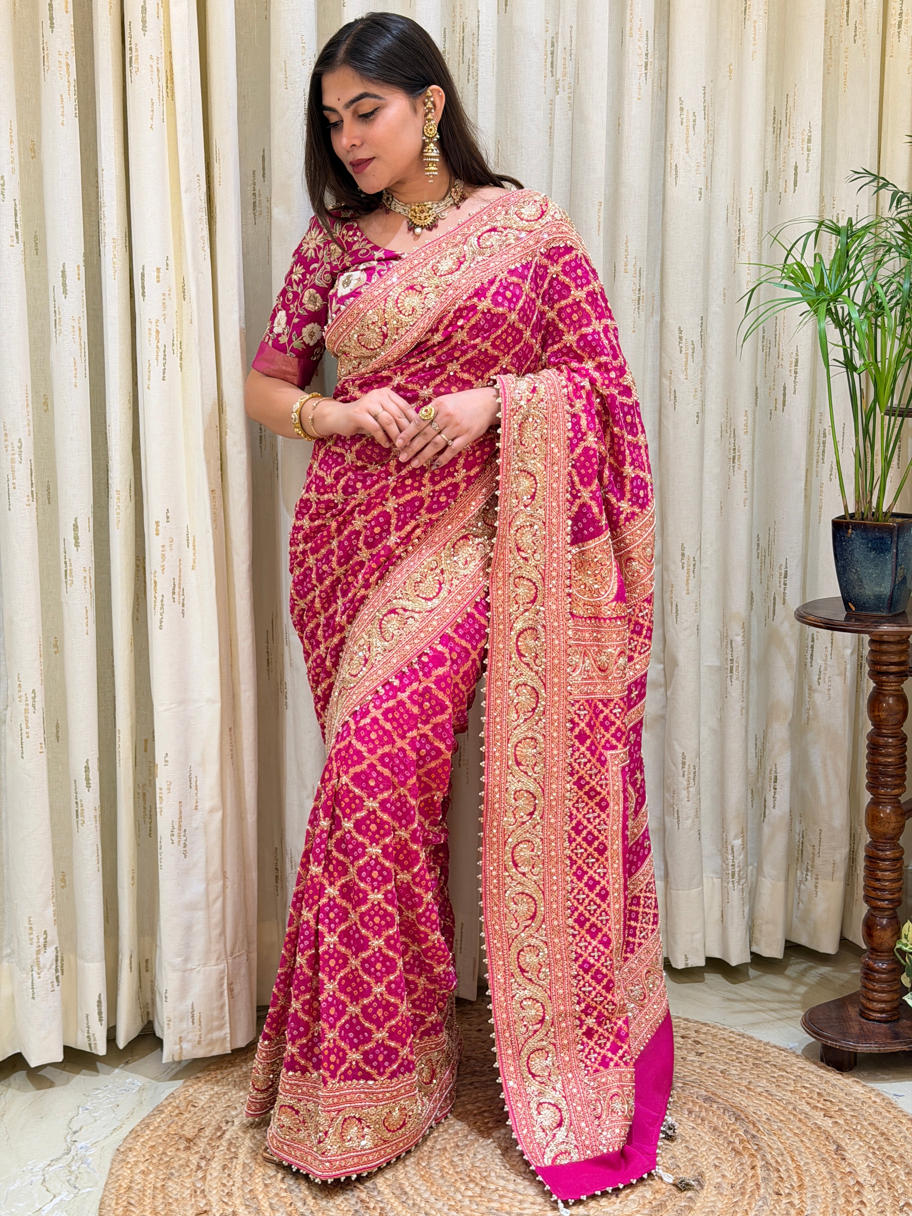 Deveshi Pink Khadi Georgette Bandhani Saree