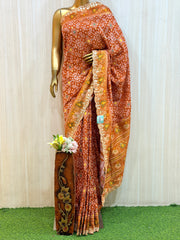 Aarohi Rust Orange Traditional Patola Silk Saree