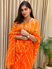 Trisha Leheriya Orange Saree