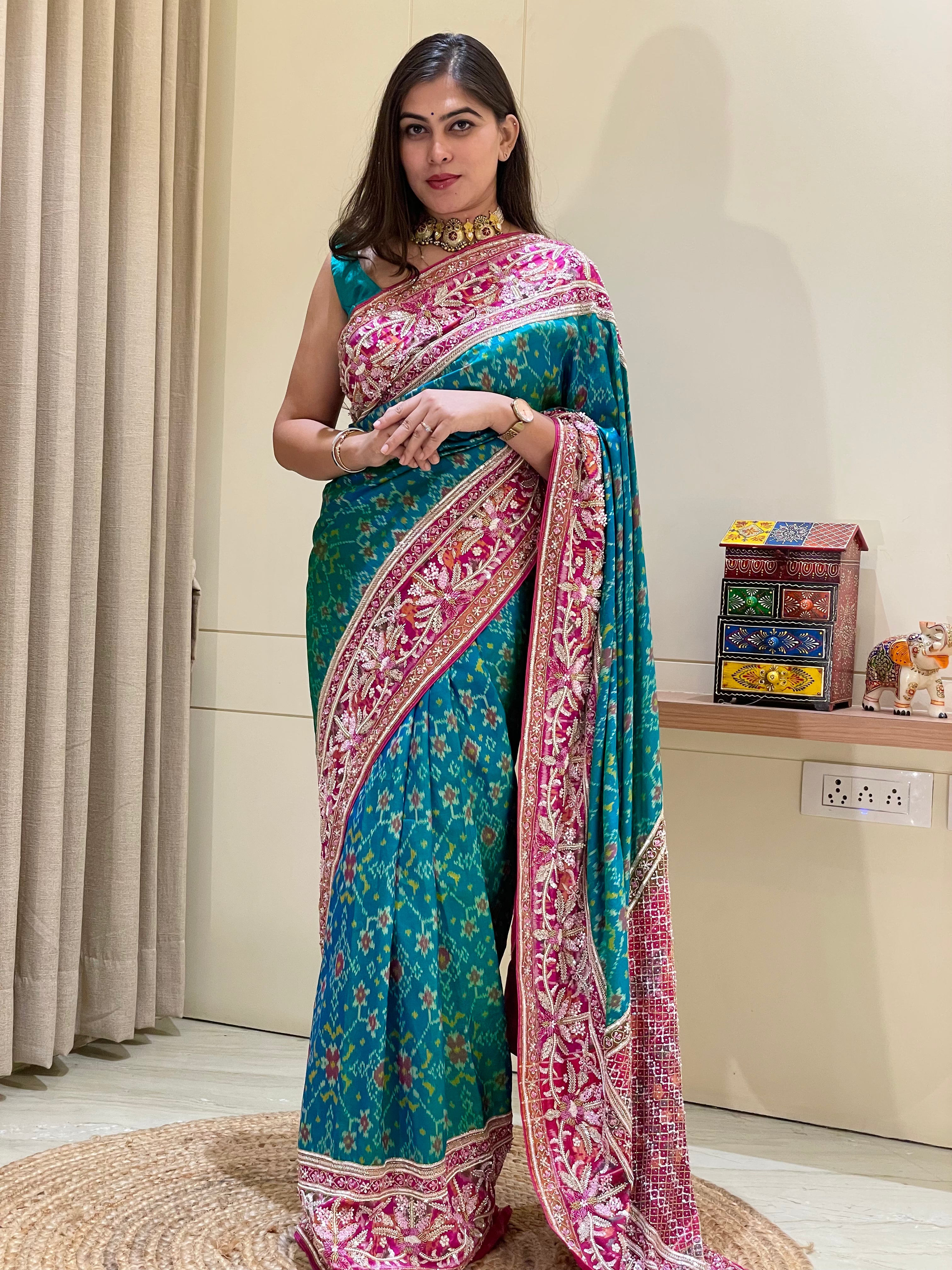 Nikita Pure Blue And Green Pratola Silk Saree