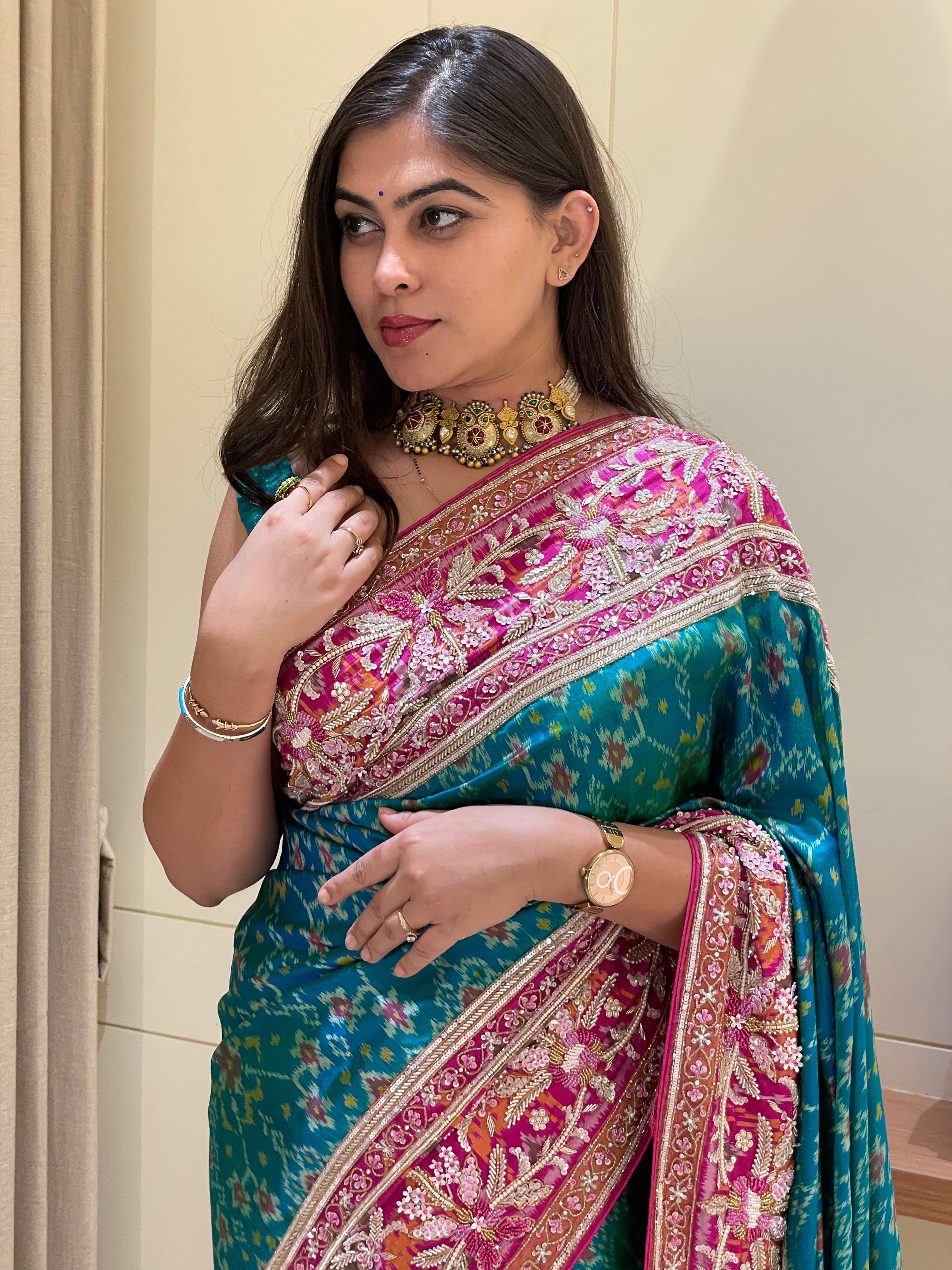 Nikita Pure Blue And Green Pratola Silk Saree