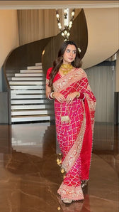 "Sonali Singh inspired red Khadi Georgette Bandhani saree with heavy zari embroidery by Pratibha Sarees."