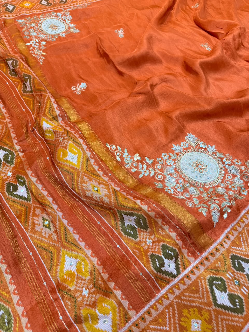 Aarohi Rust Orange Semi Ikkat Patola Saree