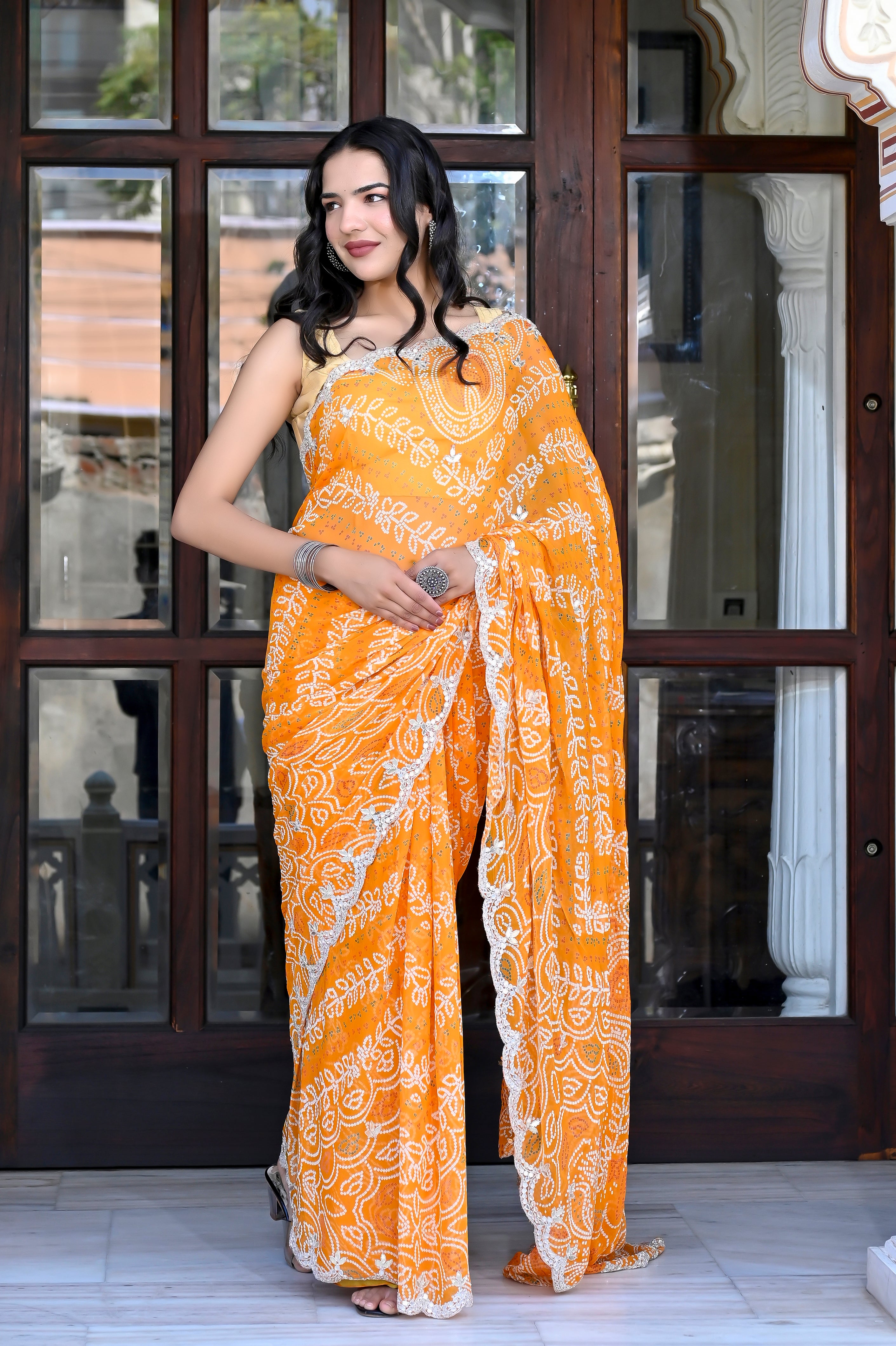 Deepika Yellow bandhej Chiffon Saree