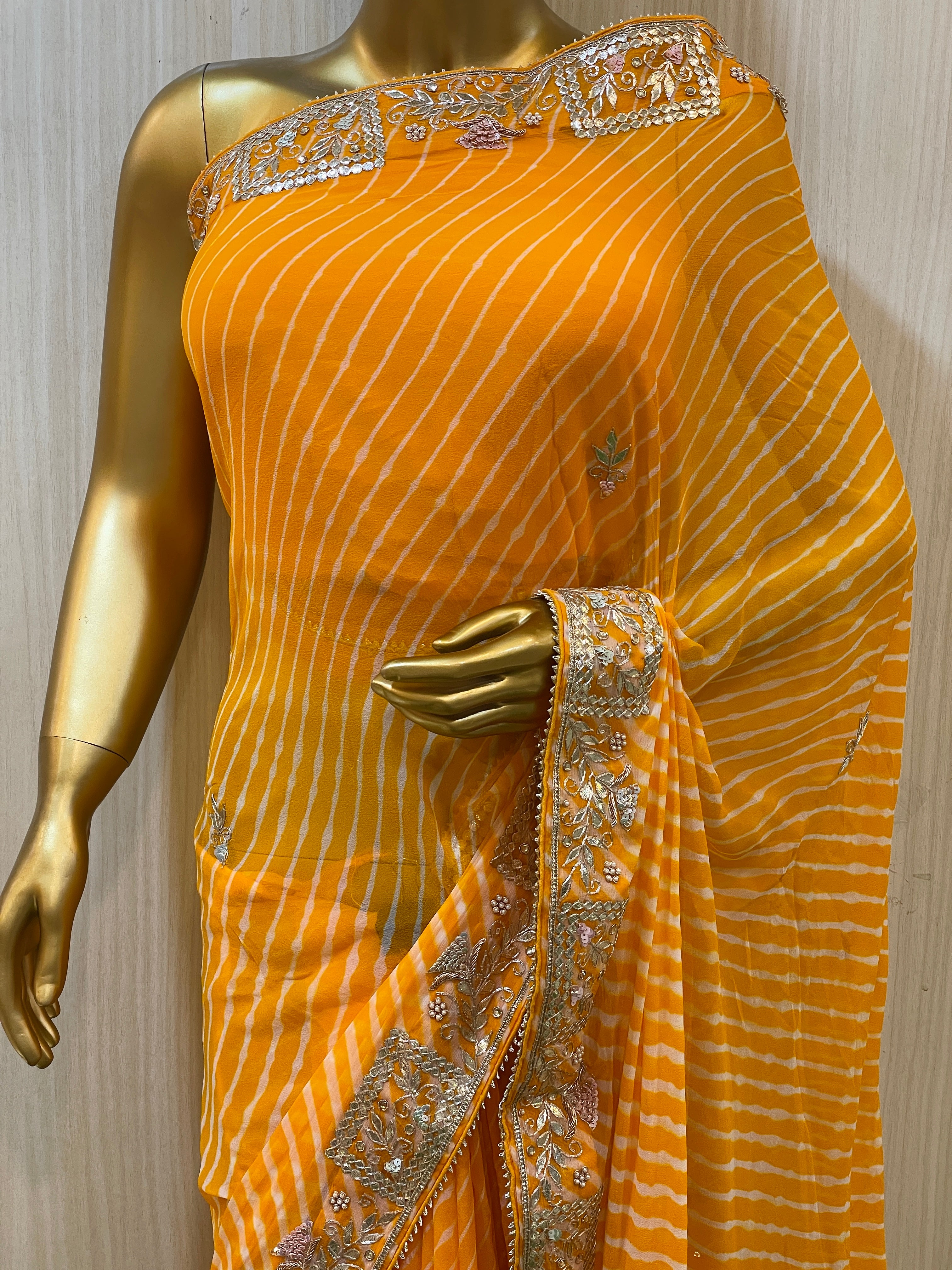 Radhika Yellow Leheriya Saree
