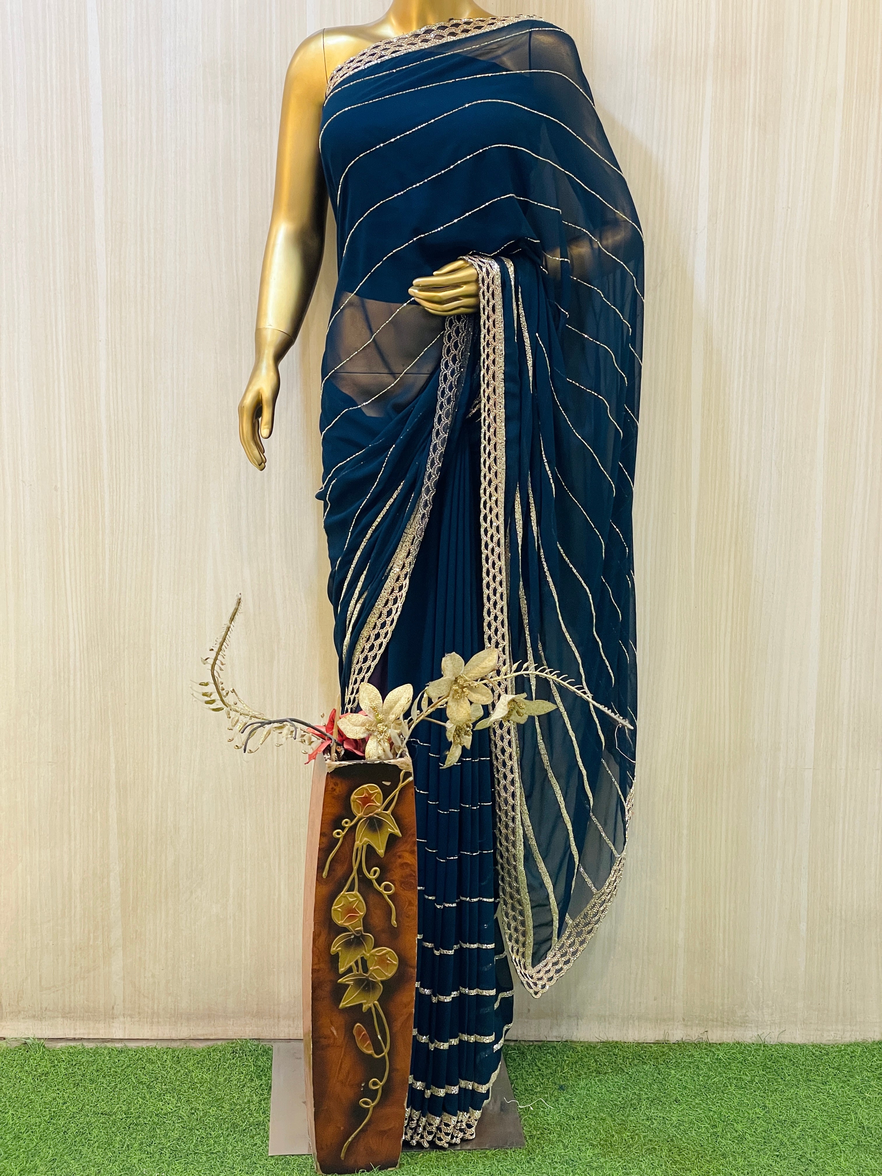 Vinisha Blue Georgette Saree