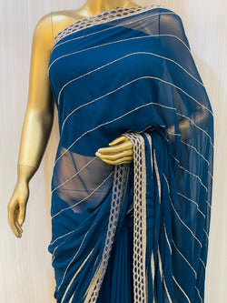 Vinisha Blue Georgette Saree