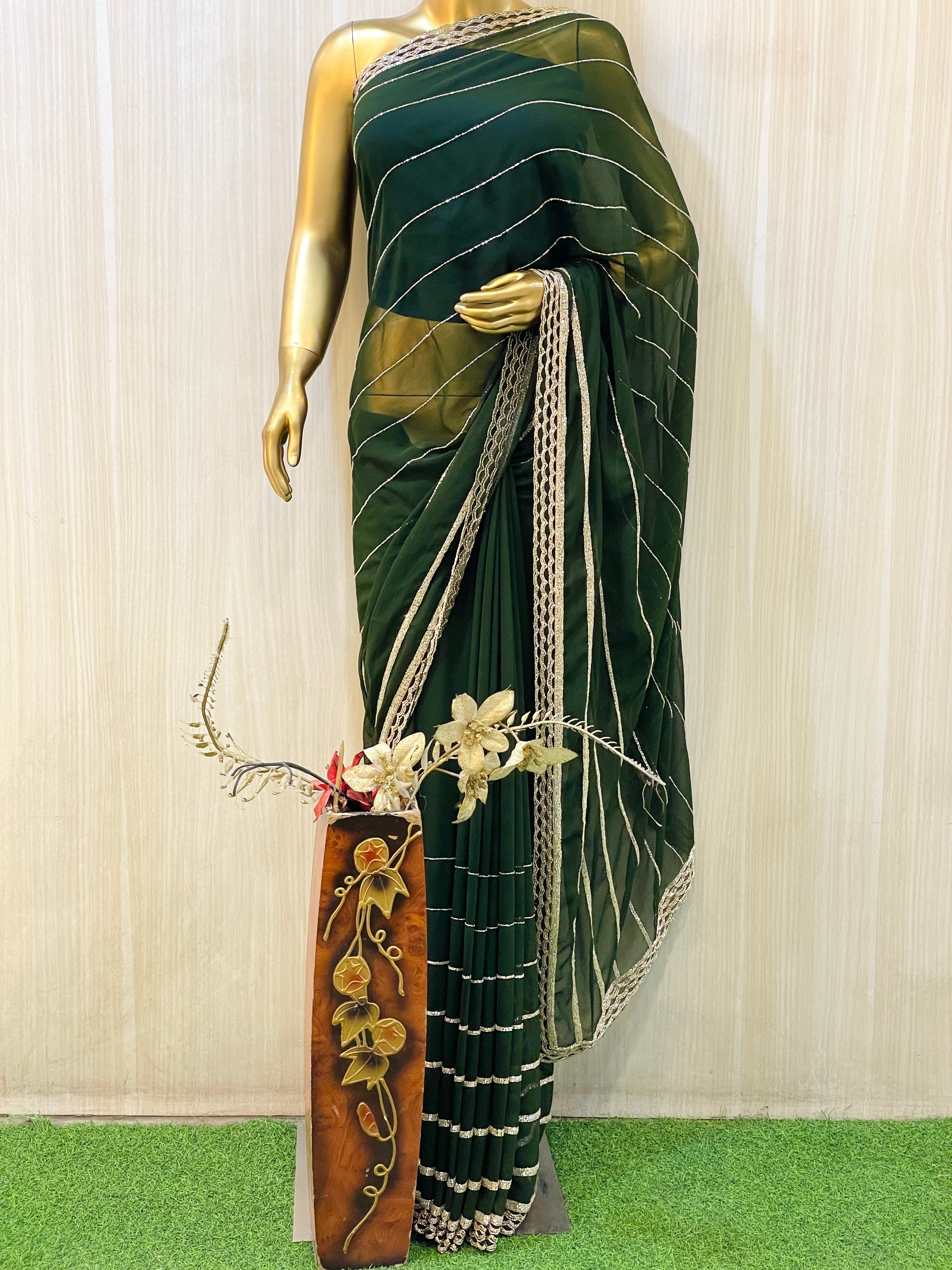 Vinisha Green Georgette Saree