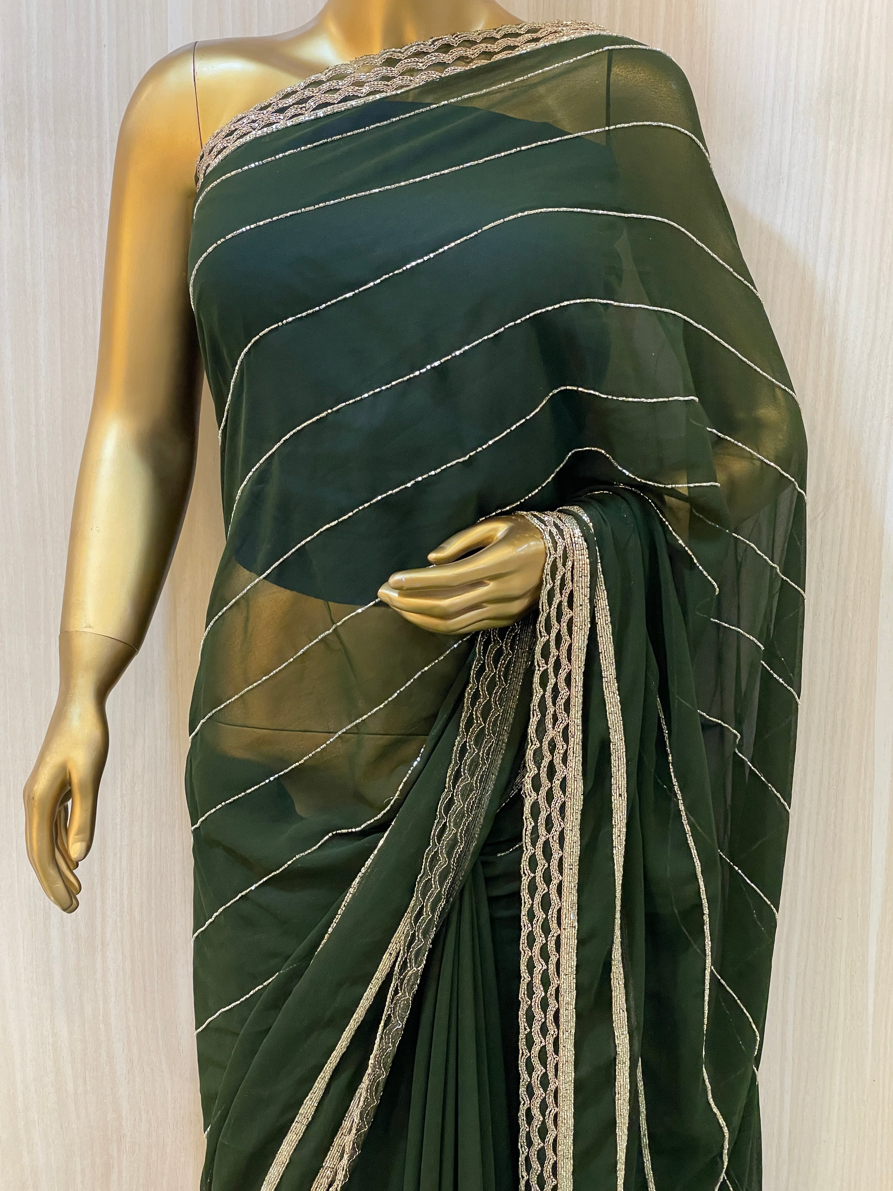 Vinisha Green Georgette Saree