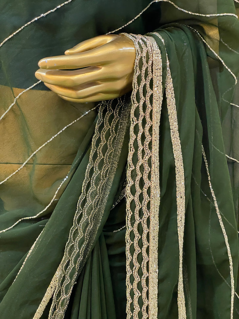 Vinisha Green Georgette Saree