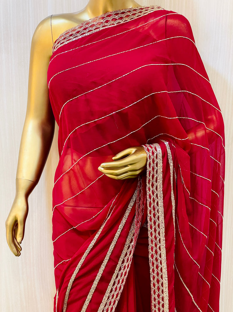 Vinisha Red Georgette Saree