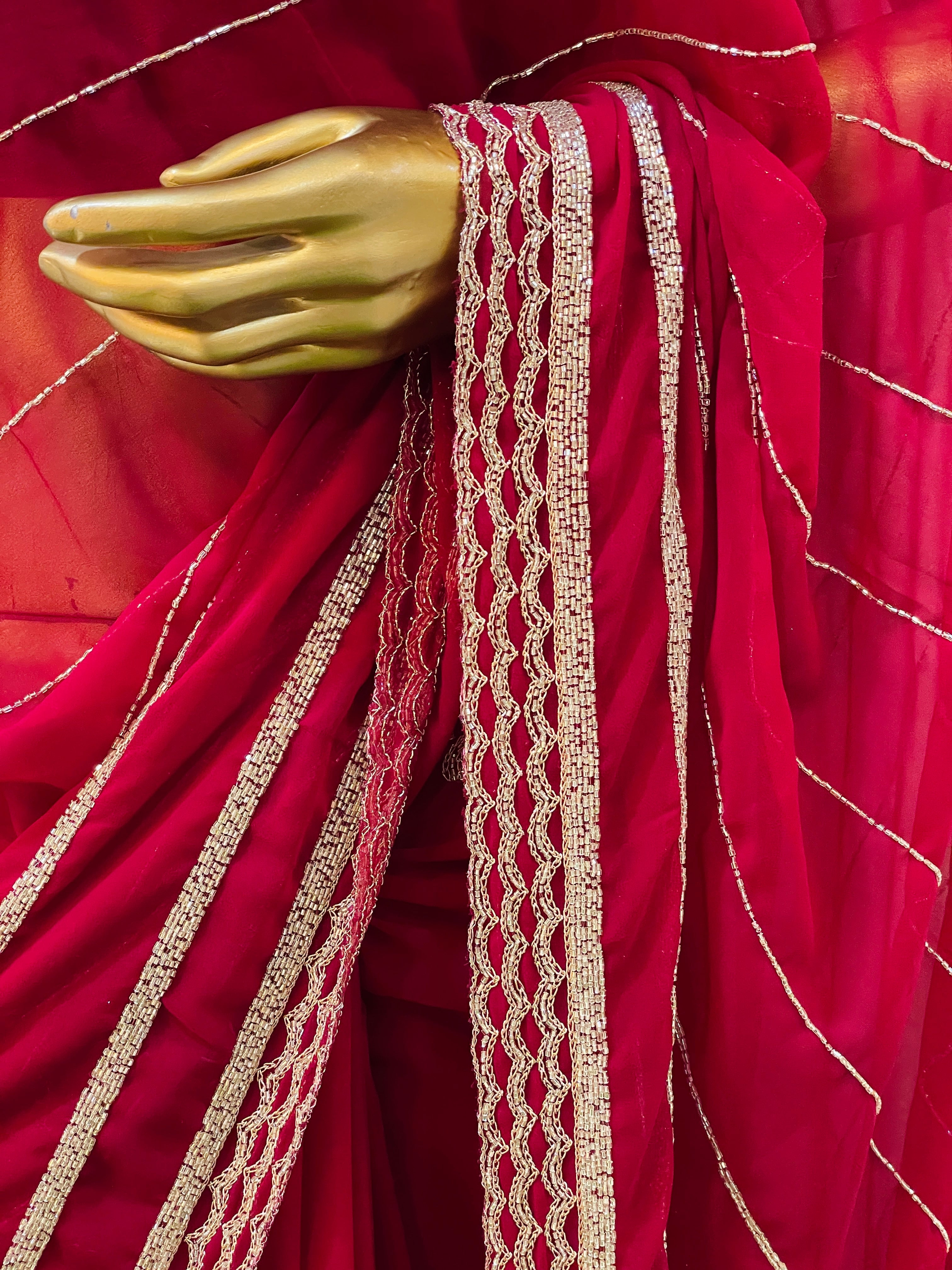 Vinisha Red Georgette Saree